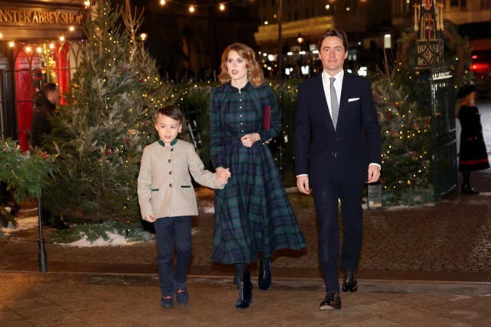 Wolfie holding hands with Princess Beatrice as they arrive with Edoardo Mapelli Mozzi at the Princess of Wales's Together At Christmas service at Westminster Abbey in 2023