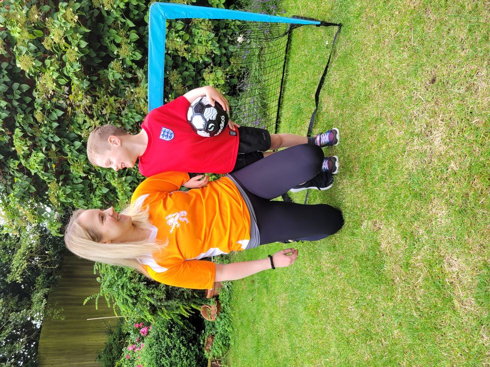 Woman and boy looking at each other