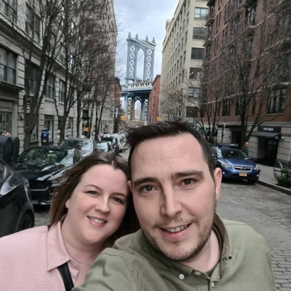 Woman and man looking at the camera