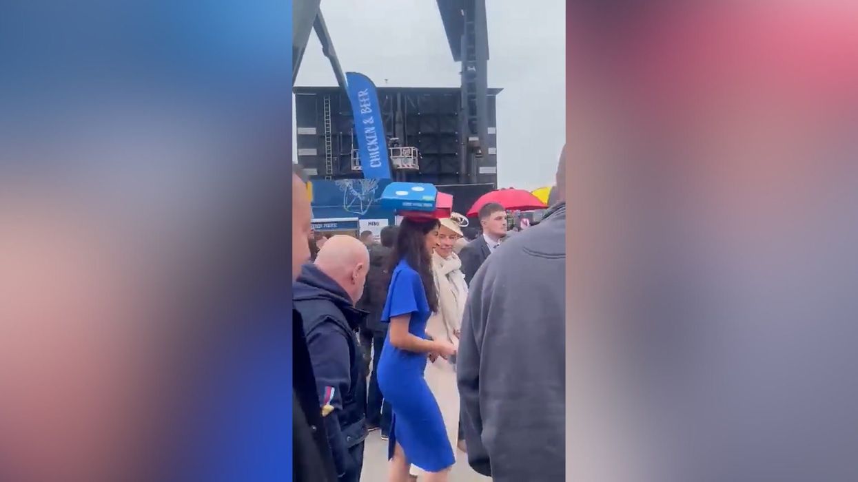 Cheltenham Ladies' Day guest wears Dominos themed fascinator complete with hidden pizza