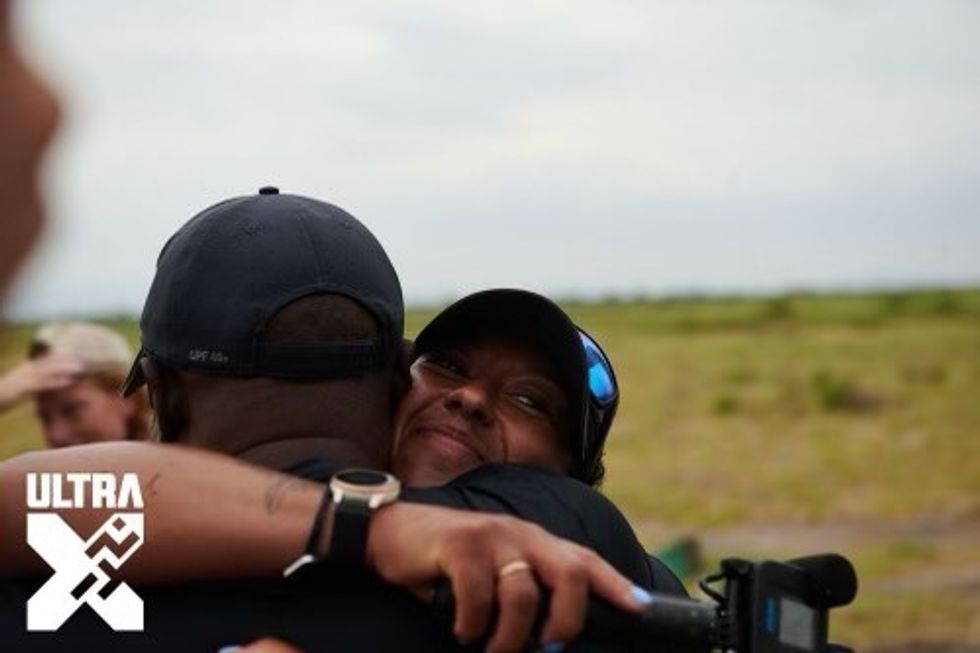 Woman hugging man