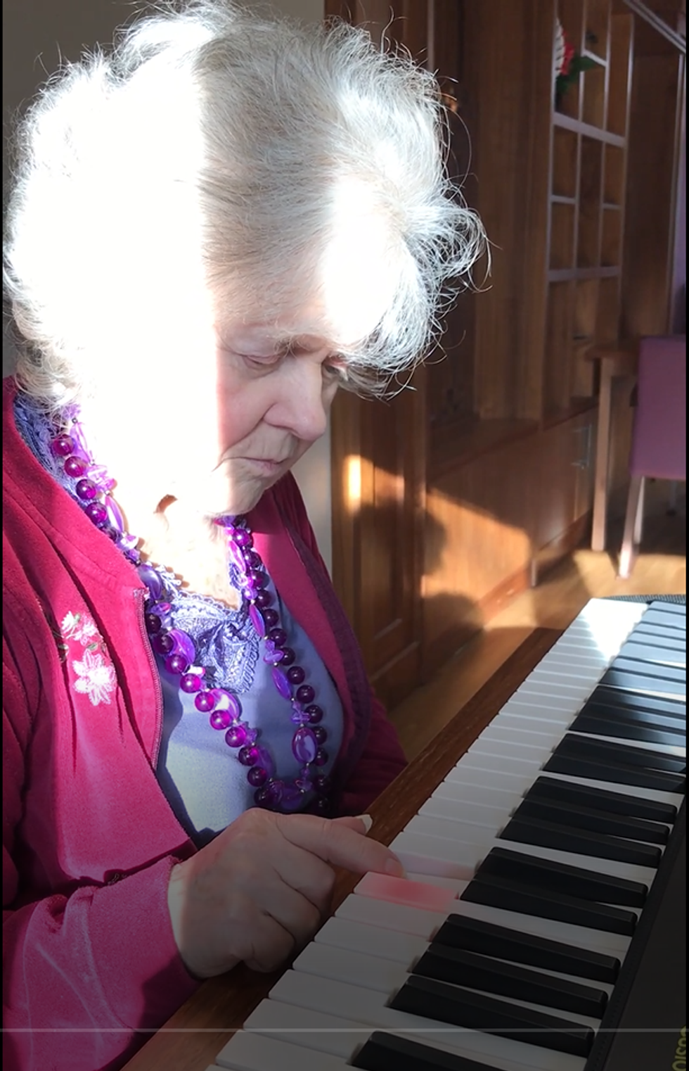 Woman playing the keyboard