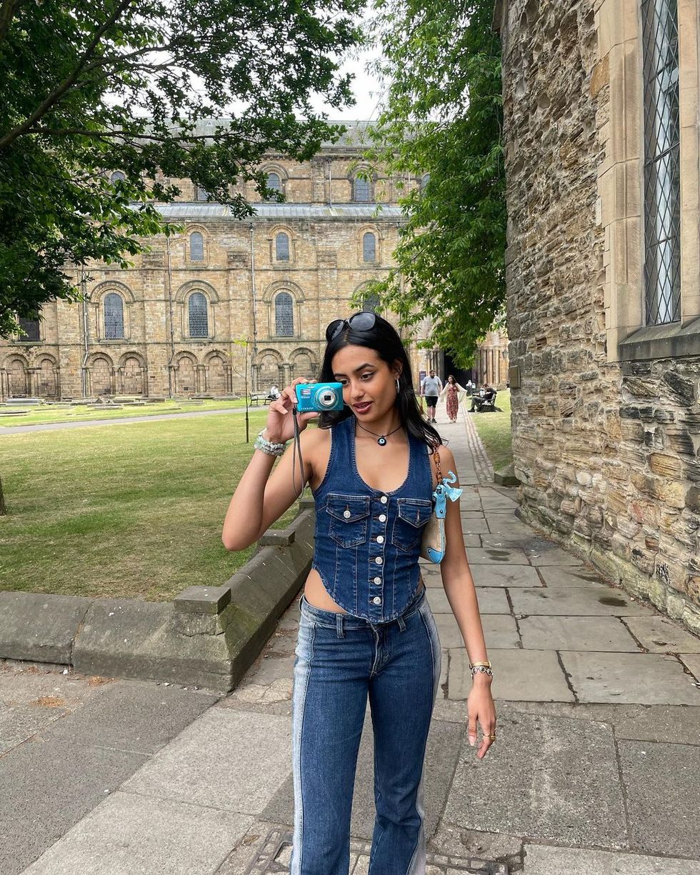 Woman posing with camera