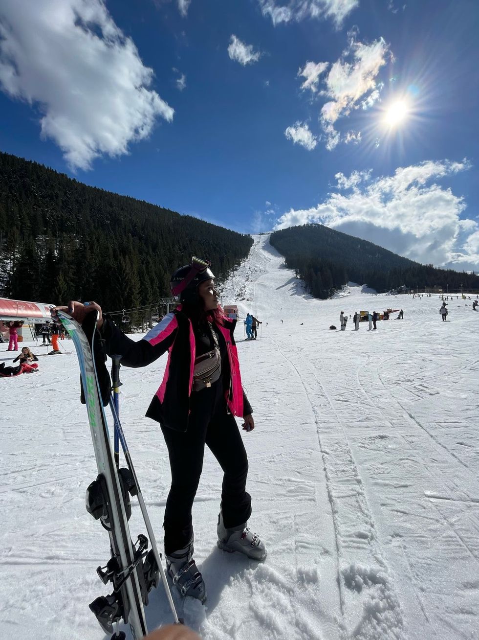Woman standing on snow