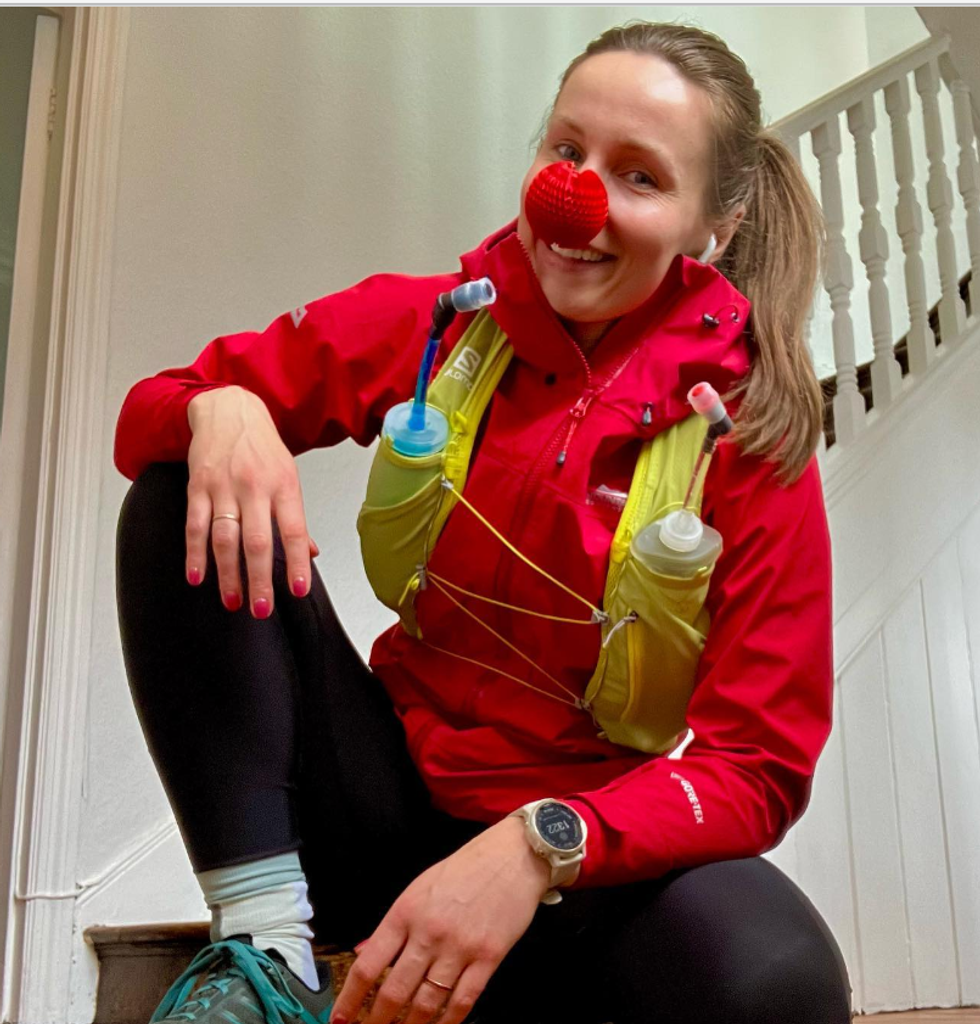 Woman wearing a red nose