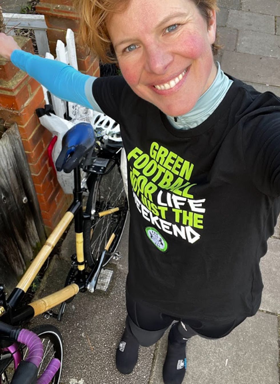 Woman with arm outstretched