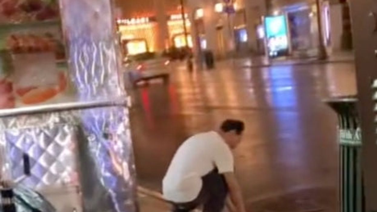 <p>Worker at street food cart in NYC filmed washing cloth in puddle during storm</p>
