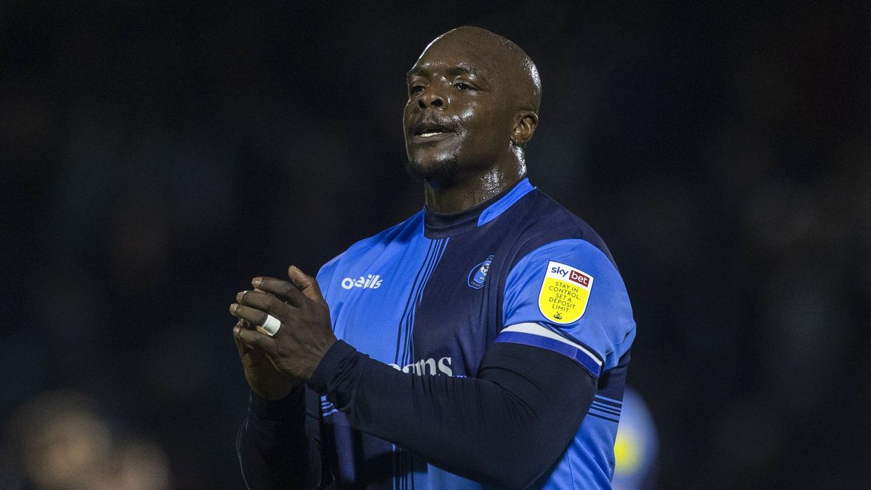 Wycombe Wanderers’ Adebayo Akinfenwa applauds the fans after a match (PA)