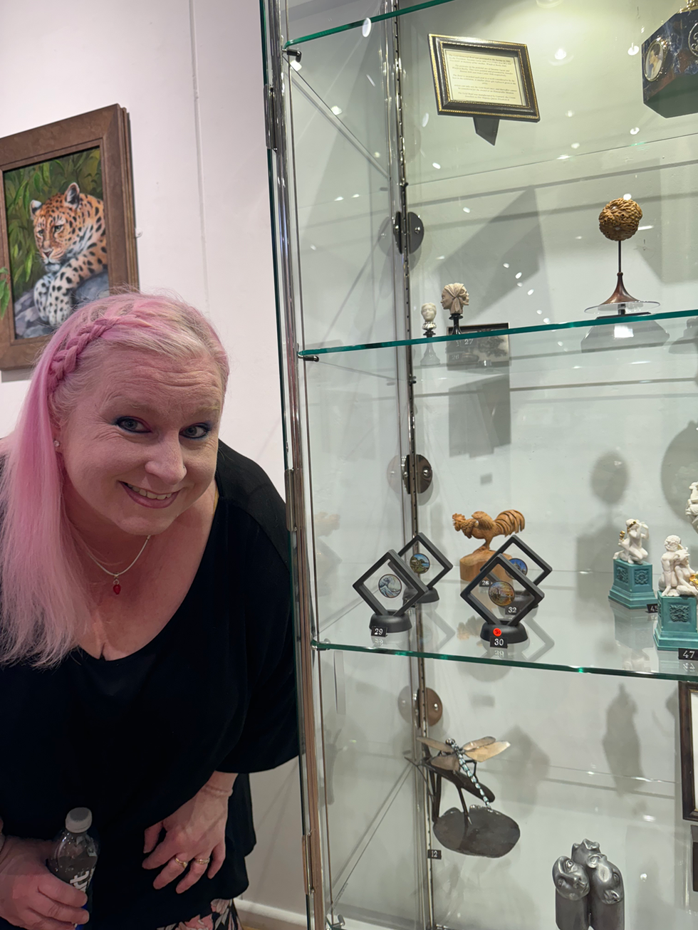 Artist ‘overjoyed’ as painted coins on show at prestigious miniatures exhibition