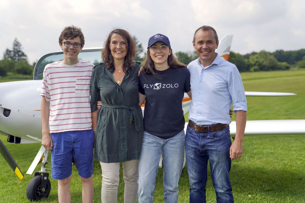 Zara Rutherford (second right) with her family (L to R) brother Mack Rutherford, mother Beatrice de Smet and father Sam Rutherford (Steve Parsons/PA)